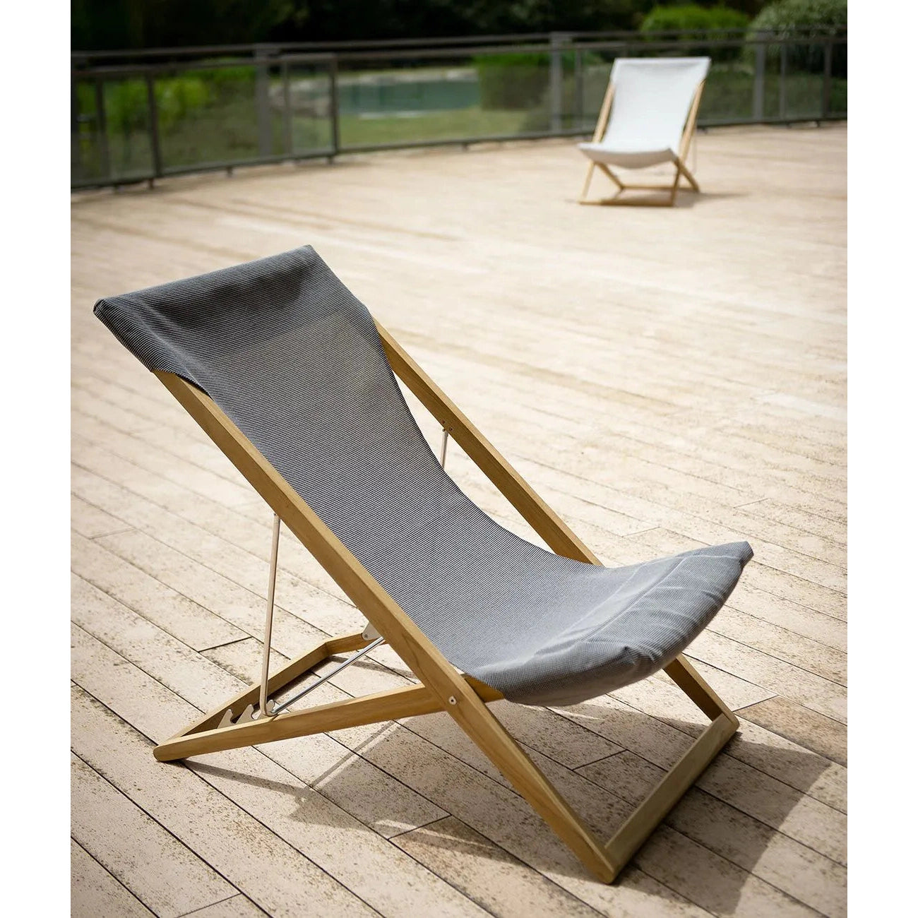 Unopiu - Cosette reclining chair made of teak wood